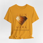 Golden yellow Skin Girl™ t-shirt featuring the shield logo and skincare empowerment message.