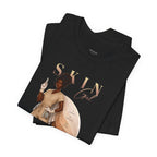 Folded black Skin Girl Fitz 6 Unstoppable esthetician graphic t-shirt with front graphic artwork