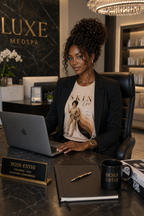 Woman wearing Skin Girl Fitz 6 unstoppable esthetician graphic t-shirt working in office 